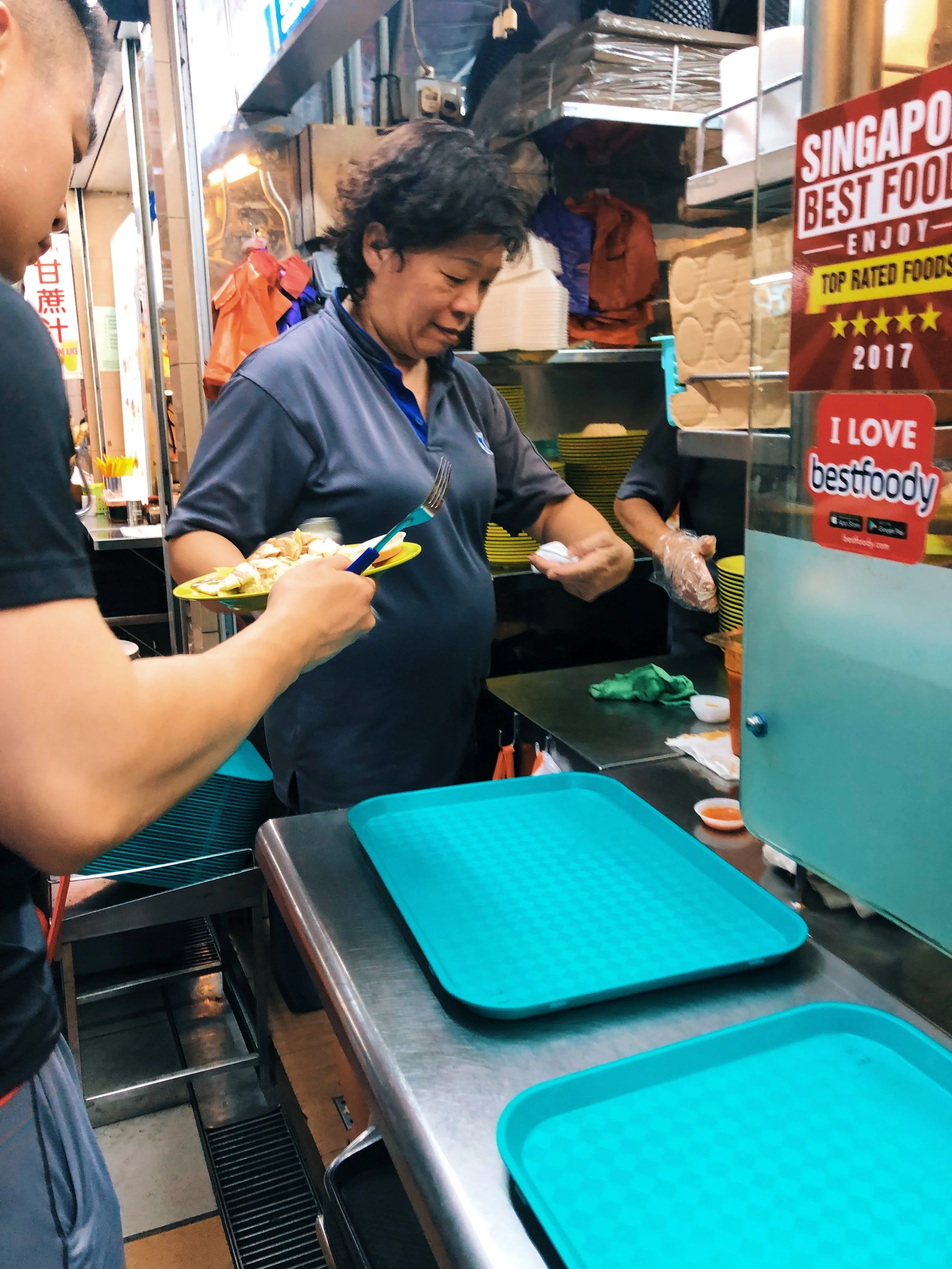 At the famous Hainan chicken rice stall in Maxwell Hawker Center