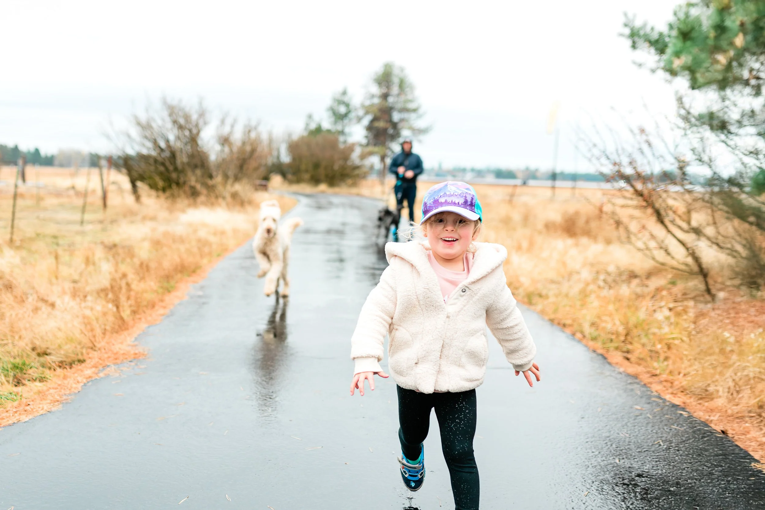 Kids and dogs walking the trails at sunriver