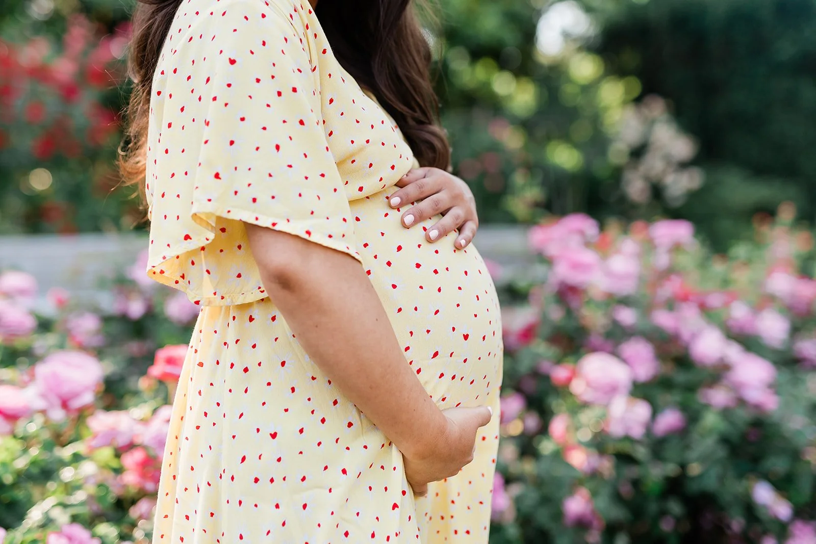 Pregnant mother at portand oregon rose garden