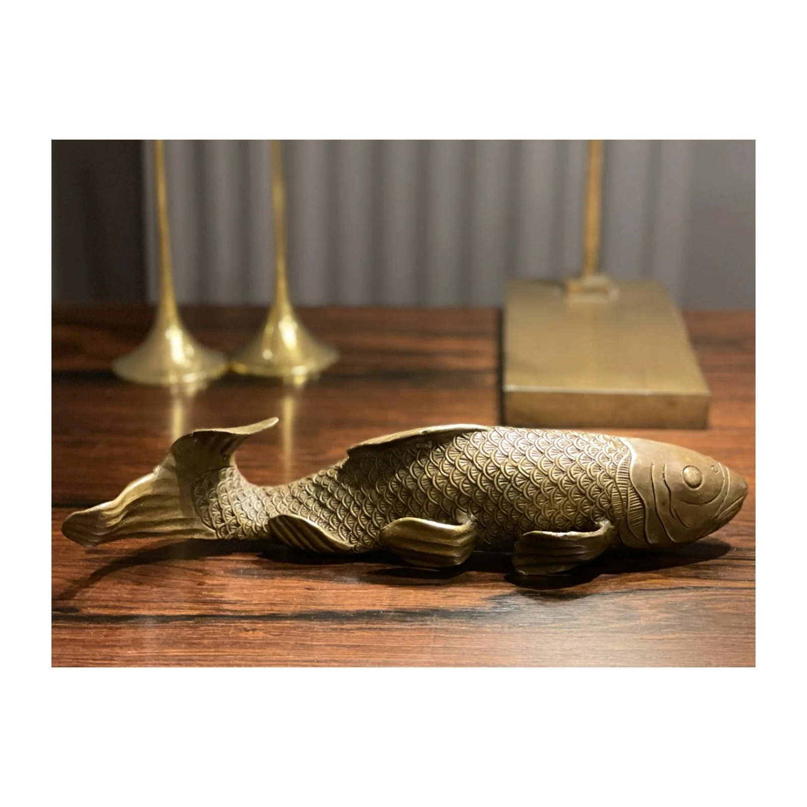 Japanese School,     20th Century A bronze sculpture of a Carp