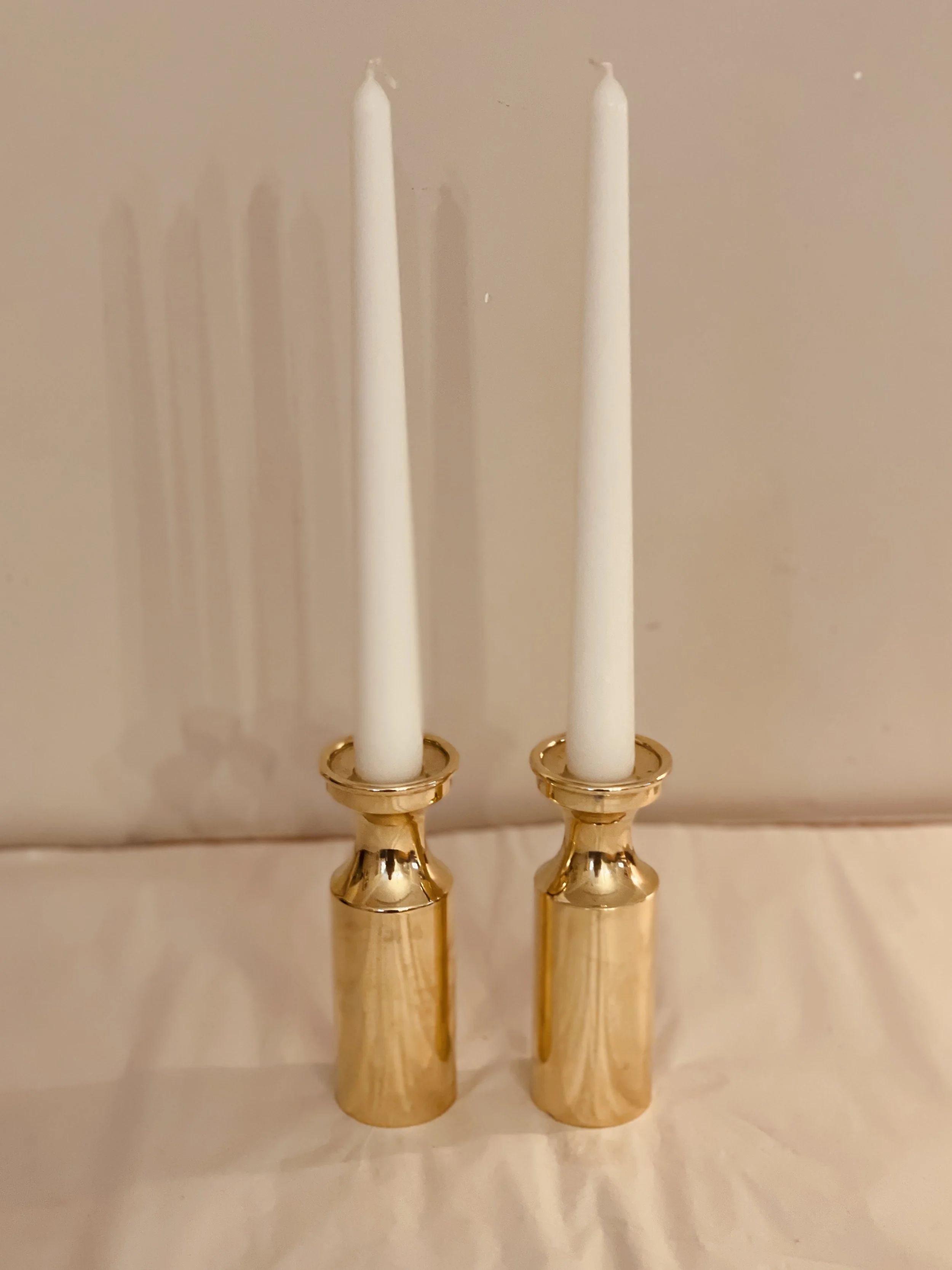 A pair of Brass Danish Candle holders.