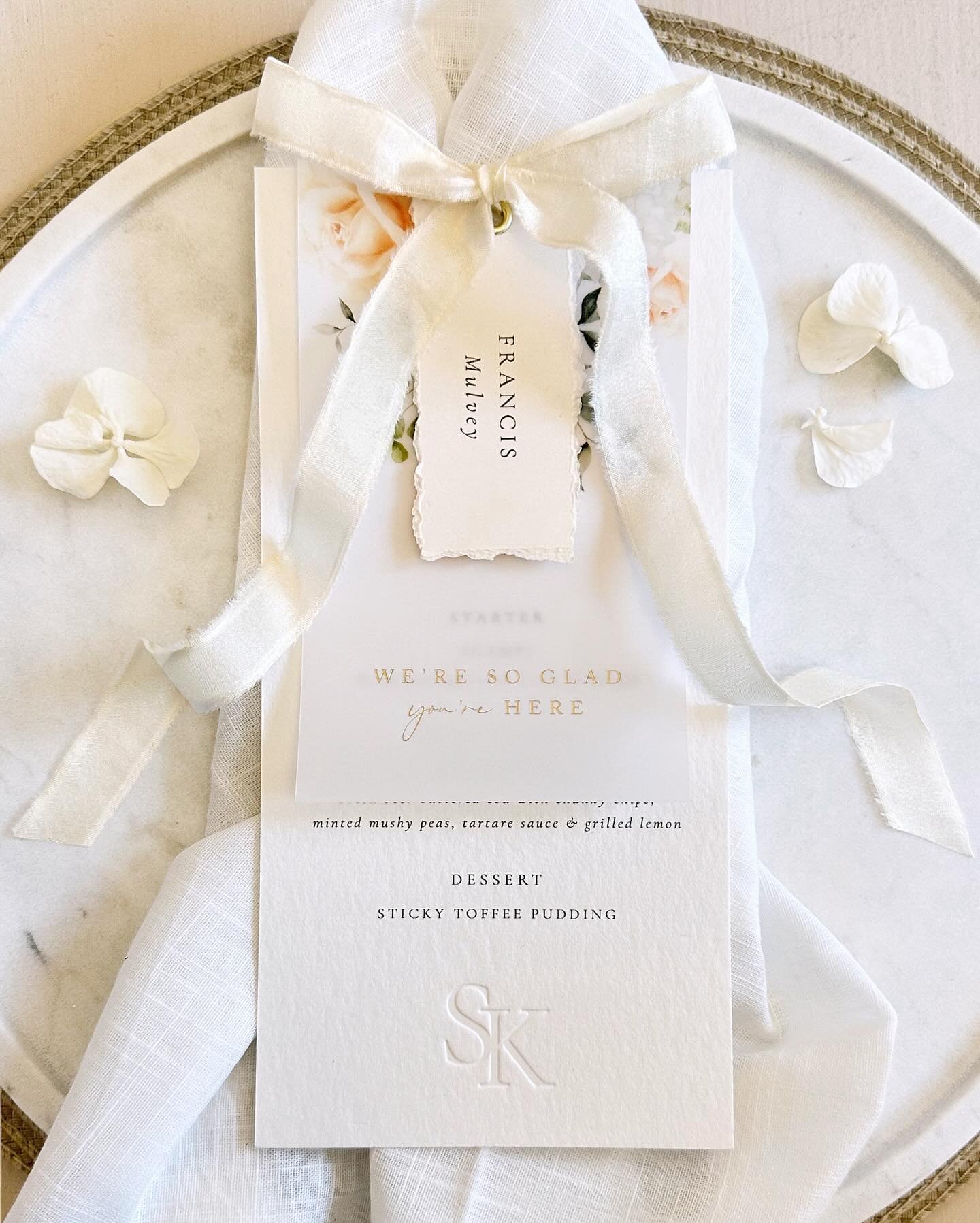 Our triple layer menus really have been a 2024 staple&hellip; and I am not complaining &bull; this whimsical beauty features decked edges, debossed details &amp; floral printed vellum &bull; hello@reebarose.com

.
.⠀
.⠀
. 
.⠀
.⠀
.⠀
.⠀

#weddingstatio