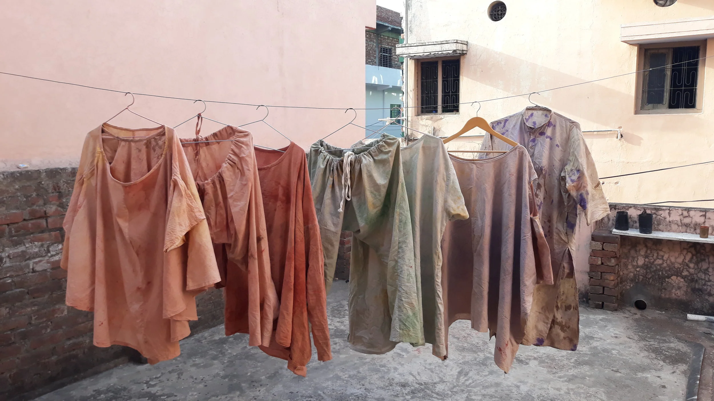 Above are the clothes I designed and painted during my time at AZIMVTH. During the design process, I tried to explore the idea of fusing my own personal aesthetic of typically quite flamboyant dress, with the more traditional shapes of indian sleepwear. Resulting in a kind of “jhabla couture”, i designed a range of chic pajamas (that would look fabulous worn out), using the traditional shapes of indian pajama, kurta, and under blouses. The eight pieces in the collection were all made with 100% cotton, and dyed using henna, spinach, tumeric, and other natural pigments. It became apparent to me quickly how wasteful the fashion industry can be, and endeavored throughout the project to minimize on waste by not using excess water to wash the fabrics during the dyeing process, as well as working with the leftovers of the pieces to reduce wastage. Certain pieces of the collection are still available for purchase, please contact for more information.