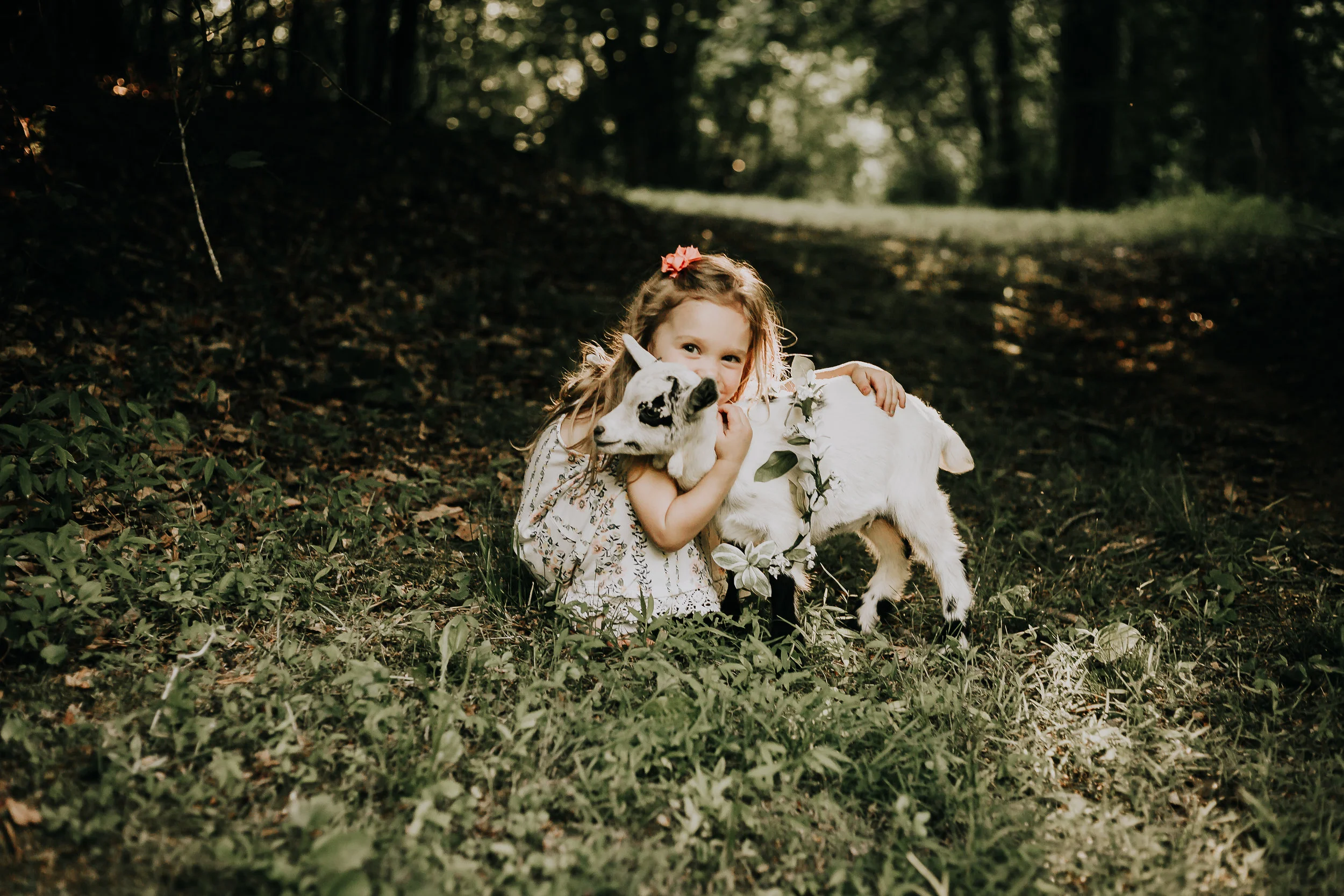 Uhg, my heart. Before my husband & I sold our home in September, we had a mini farm going on that consisted of horses, pigs, goats, and chickens. We were able to witness our goats giving birth and this is one of the babies. The little girl is one of my best friends daughters and she seriously is the cutest little model and was SO excited to get her picture taken with the baby goat! Just to add: We sold our home in September and sadly had to sell all of our animals (except the horses) because we are currently renting until we find a new place to purchase and did not have anywhere to put all of our animals. Luckily, all of our babies went to wonderful homes and even though it was super hard to say goodbye, knowing that they are in good homes definitely helps!