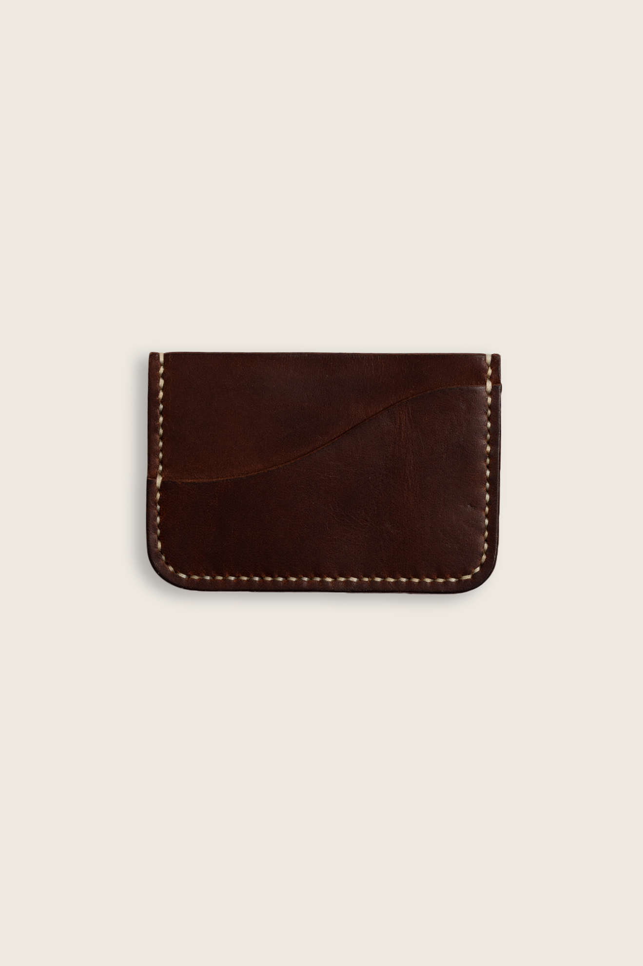 Hand stitched minimalist card holder in vegetable tanned leather mahogany