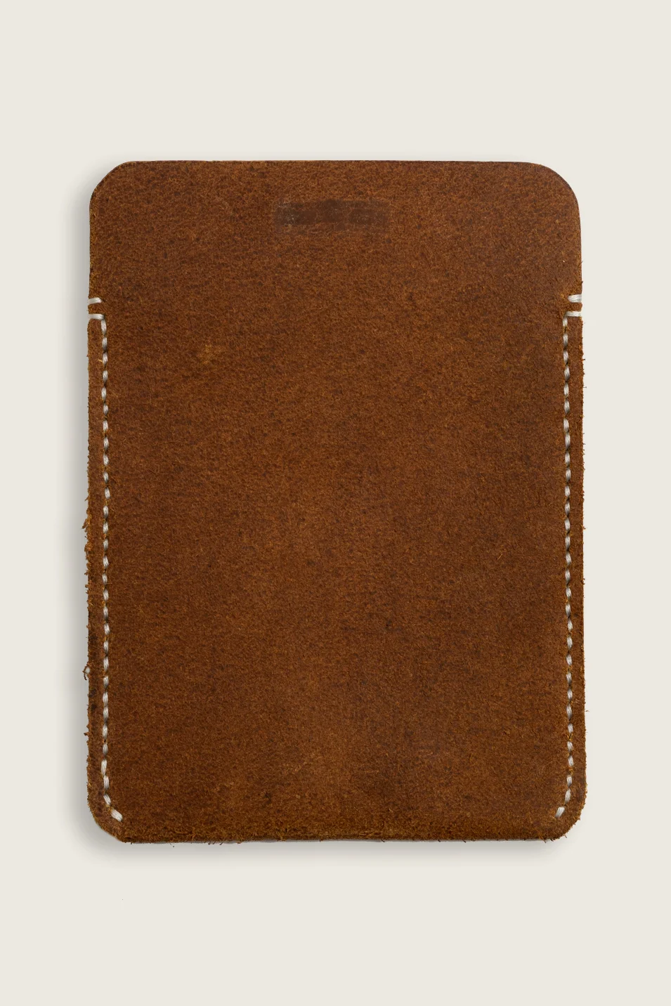 Hand stitched leather pocket protector in beech