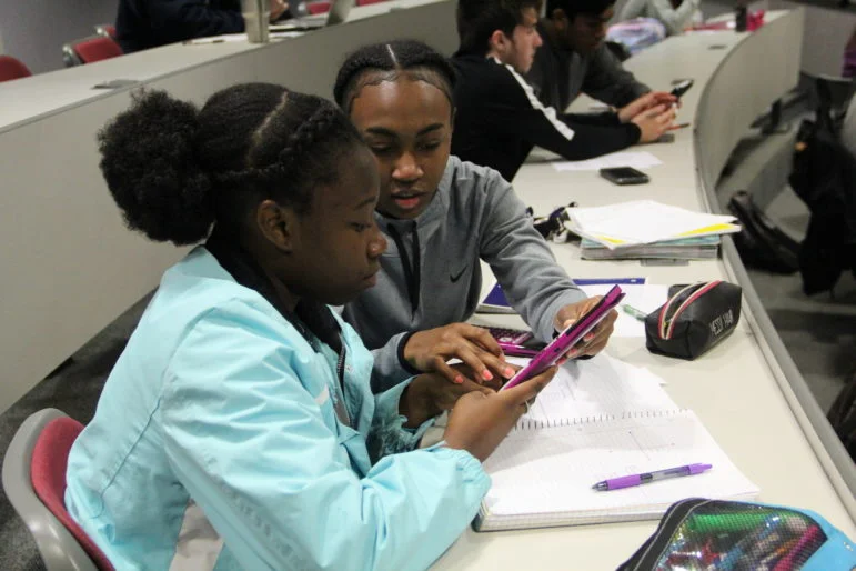 Mississippi School for Math and Science students Violet Jira and Faith Brown work on a problem about enzyme kinetics in biology class on Oct. 17, 2018.   Kayleigh Skinner/Mississippi Today