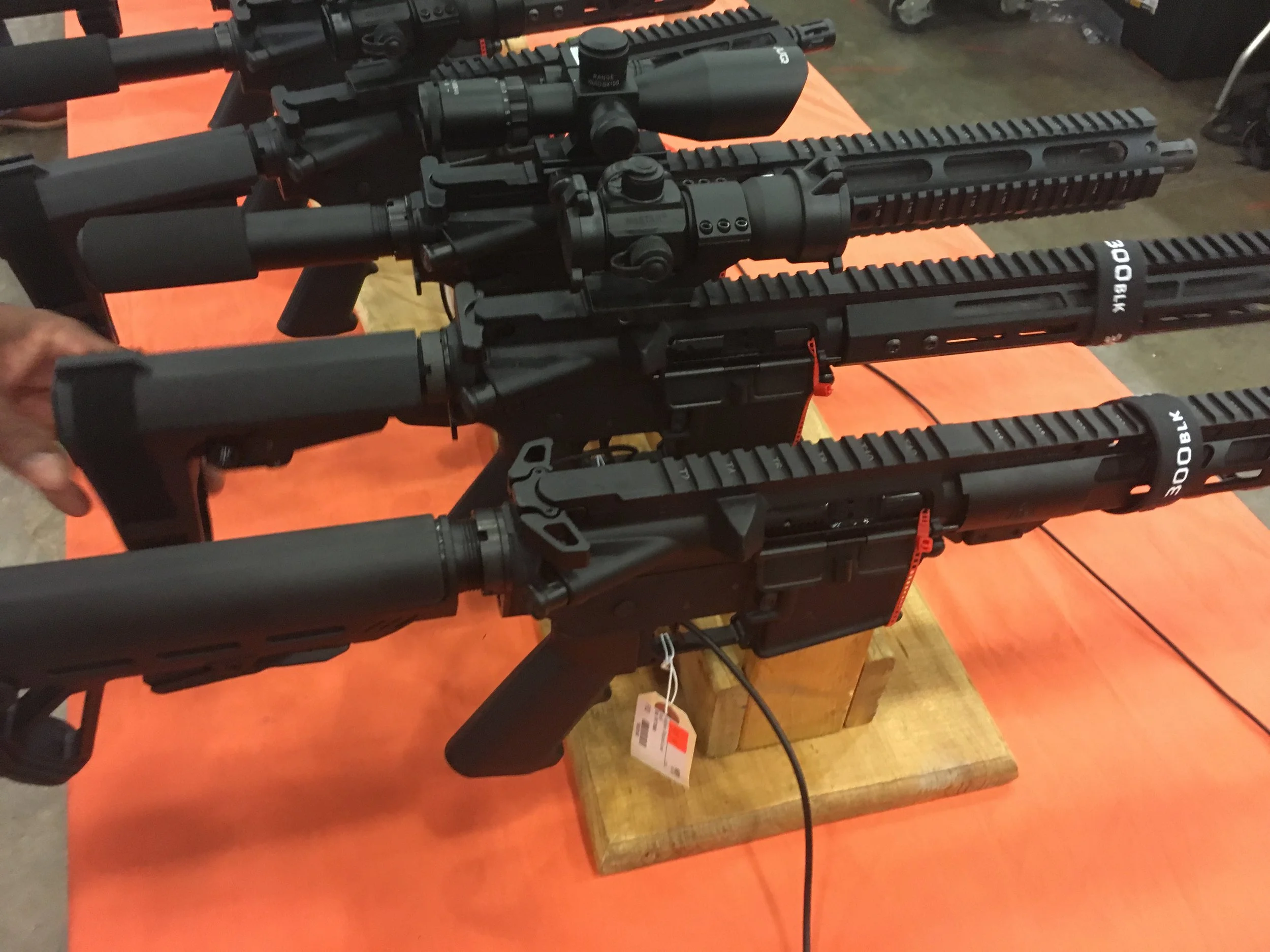 Some of the items in high demand at a gun show in Jackson, Mississippi, are pistols that are equipped with several accessories — such as a high-capacity magazine — making them similar to short rifles, but without the same federal regulations. Justin Vicory/Mississippi Center for Investigative Reporting