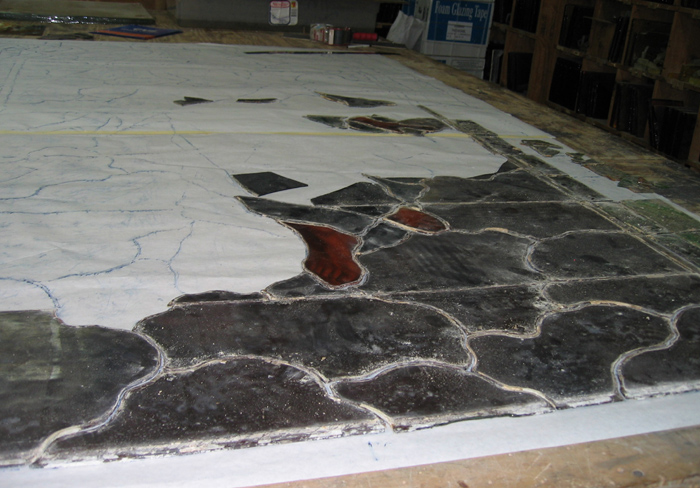 Part of the window removed from the lead and placed on the pattern.