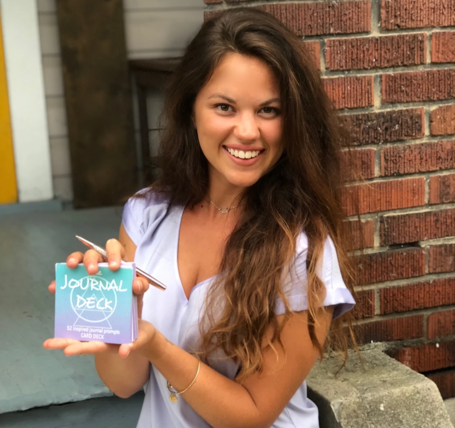 Our Founder Alyssa with our first edition deck.