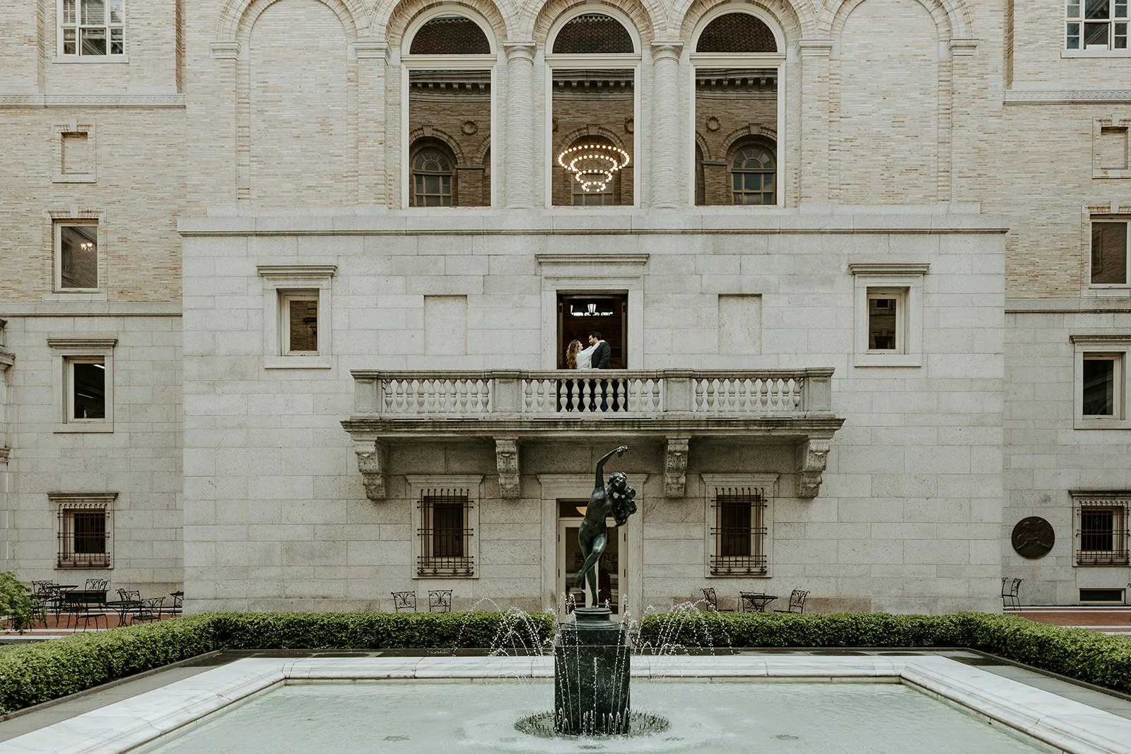 An engagement photo taken by a Bosotn engagement photographer at the Boston public library