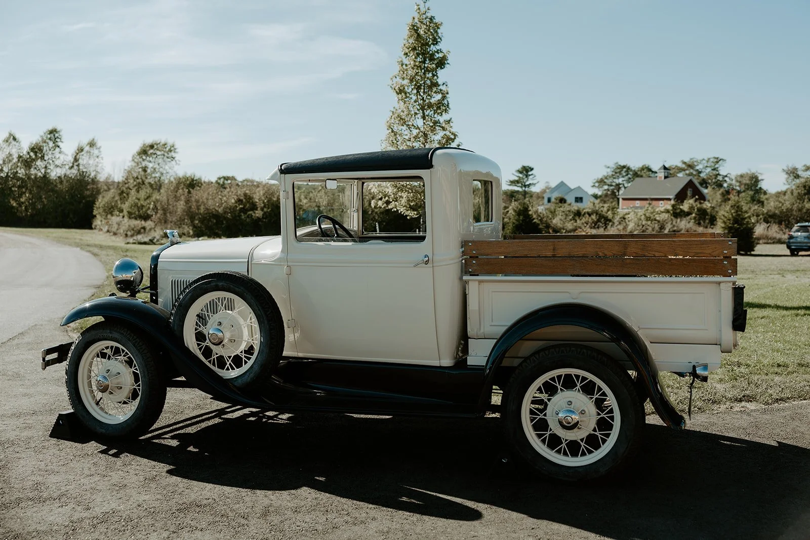 A truck as decor at a backyard wedding
