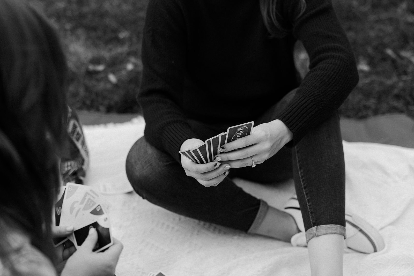 A cozy date night engagement photo outfit