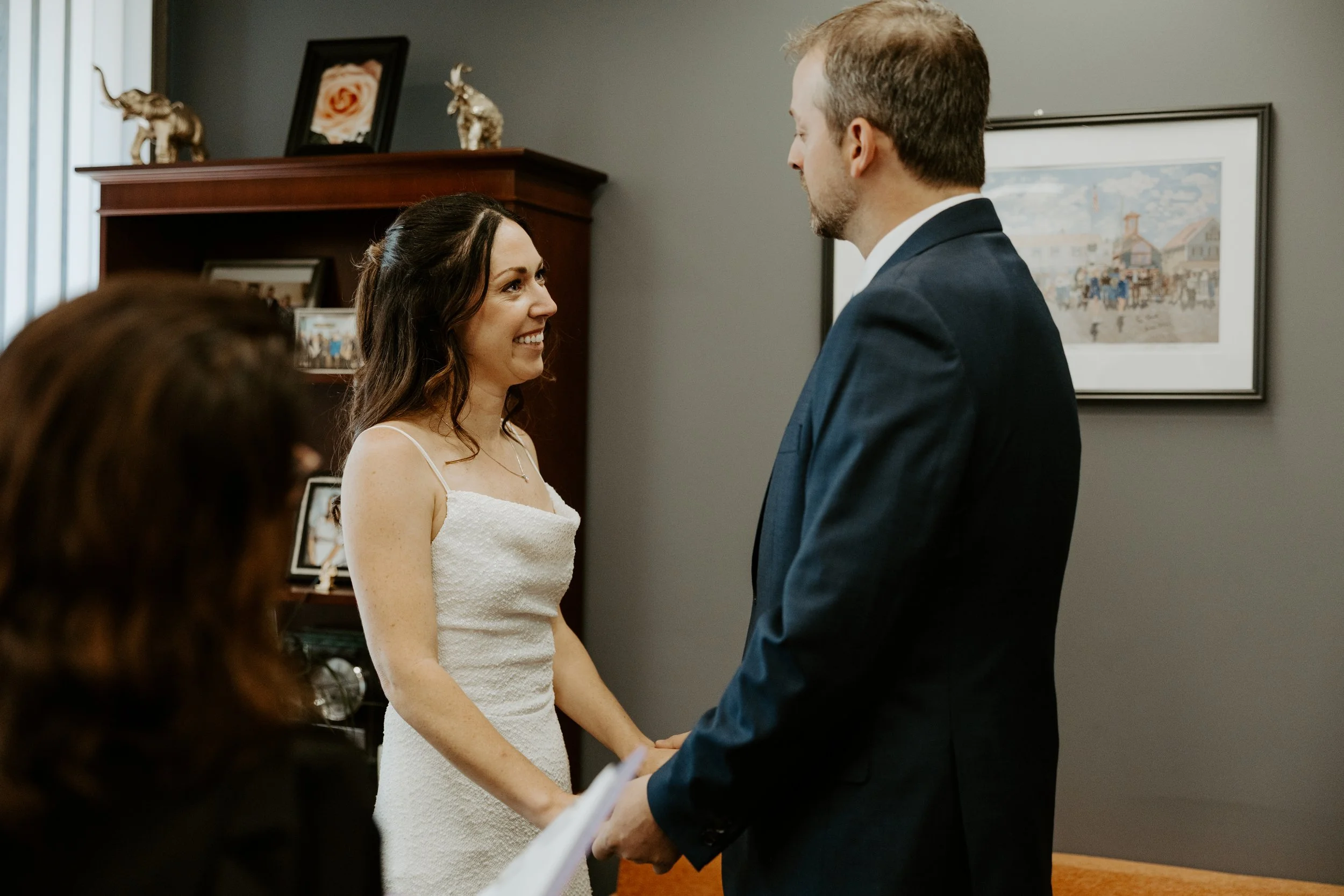 A couple in their elopement location Boston City Hall