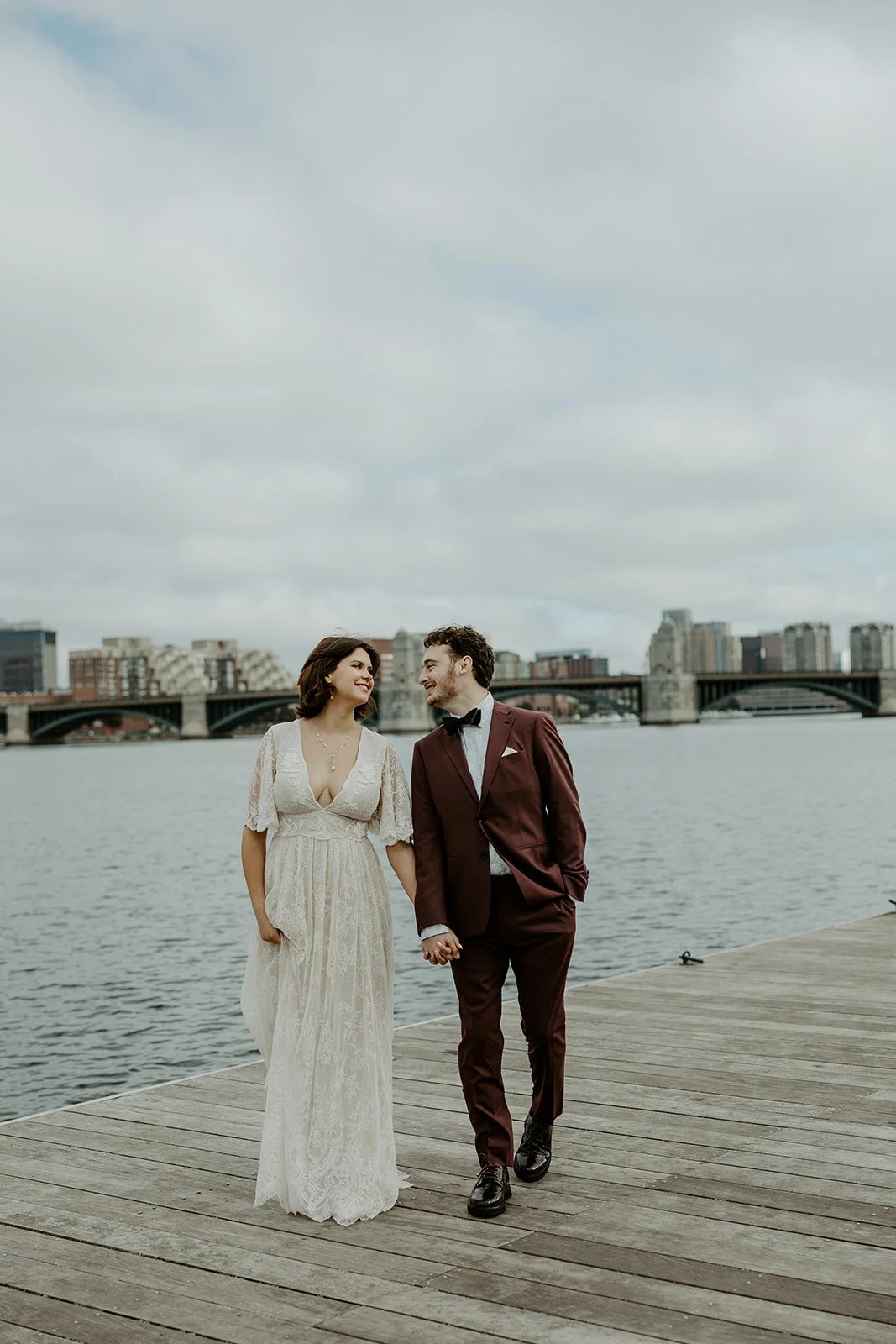 A couple walking together before their Boston Elopement at the Esplanade