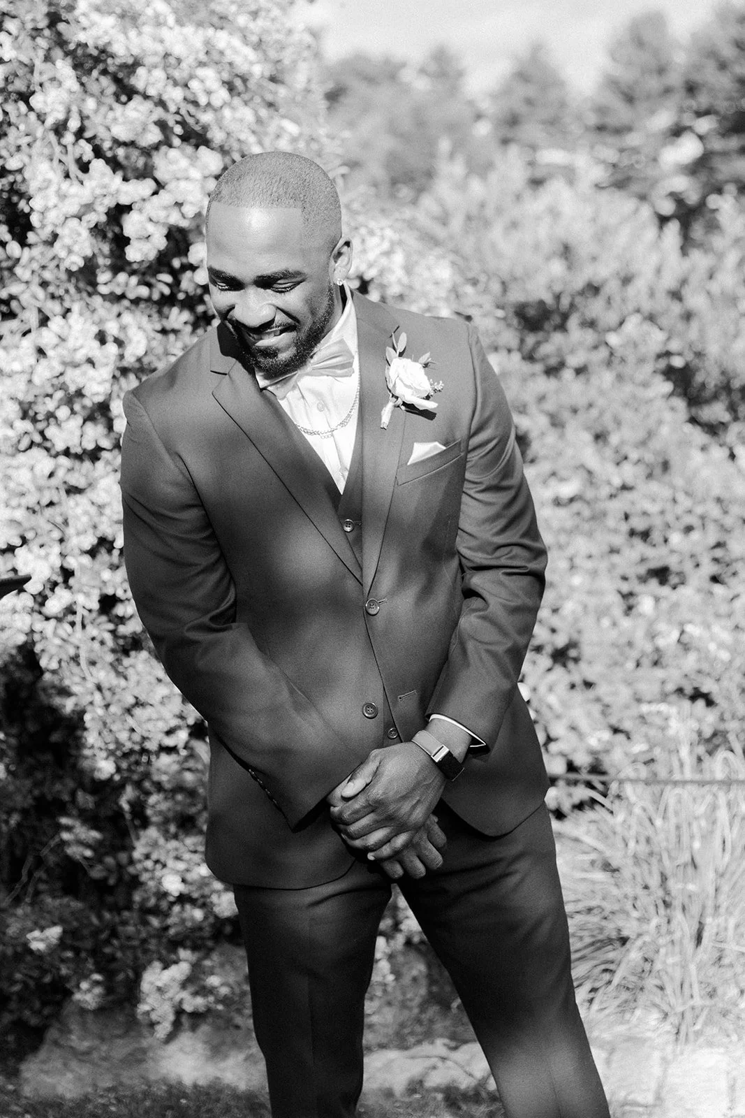 A groom's reaction to a bride walking down the aisle