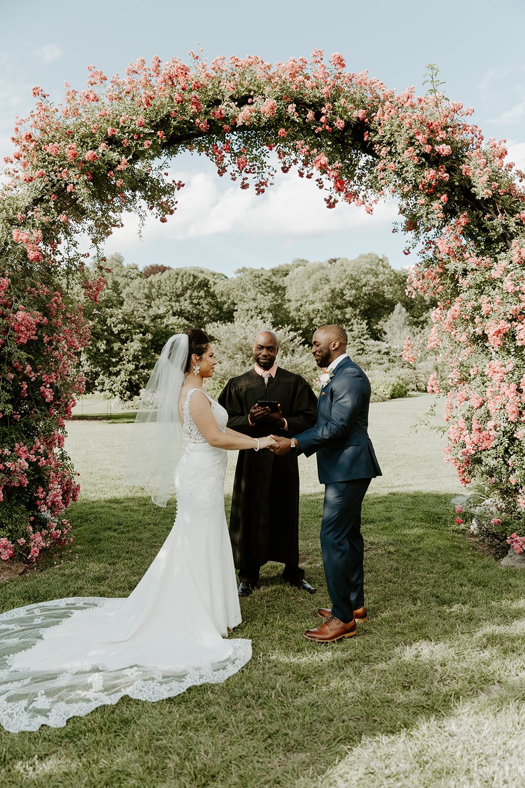A couple holding hands at their Boston elopement 