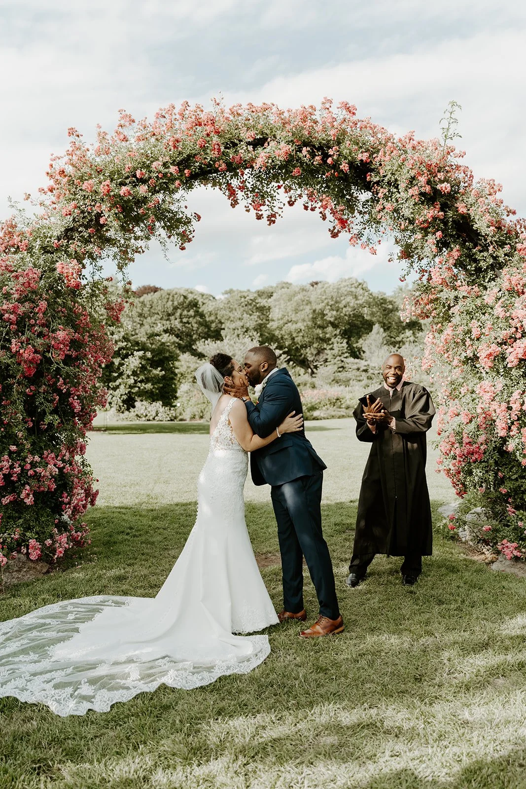 A couple sharing their first kiss during their elopement