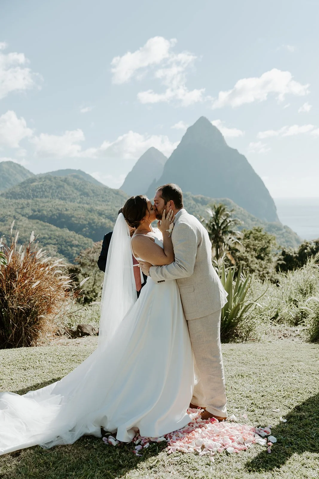 A couple kissing during their wedding photos at their destination wedding location, st lucia