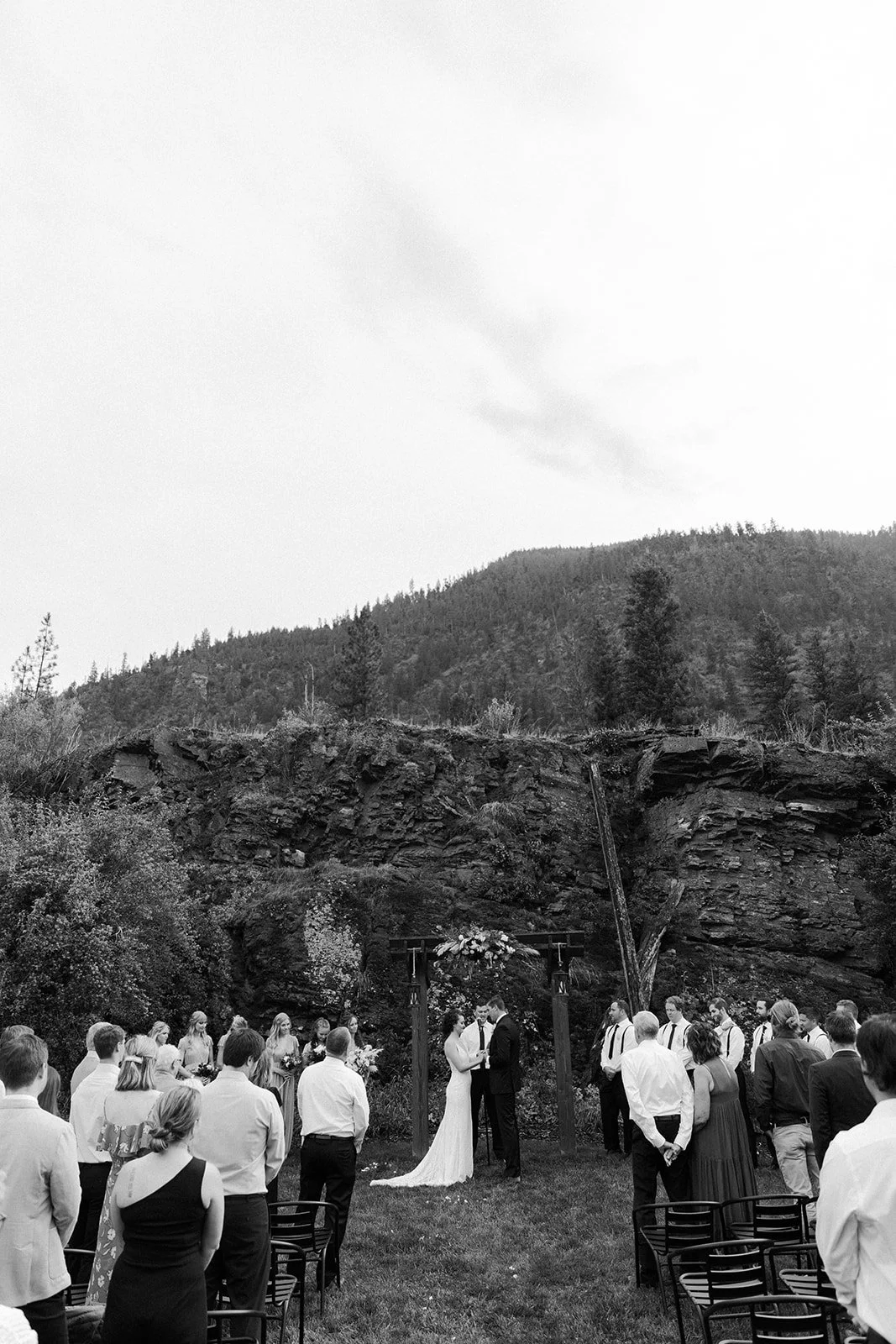 A black and white photo of a destination wedding in Montana
