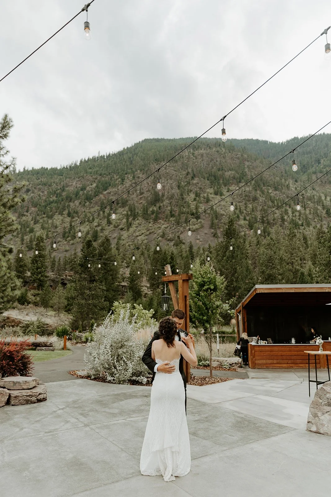 A couple sharing their first dance as a married couple