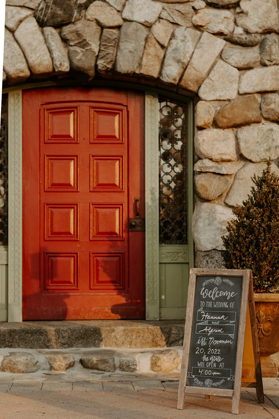 A wedding welcome sign outside of the door at a Massachusetts wedding venue