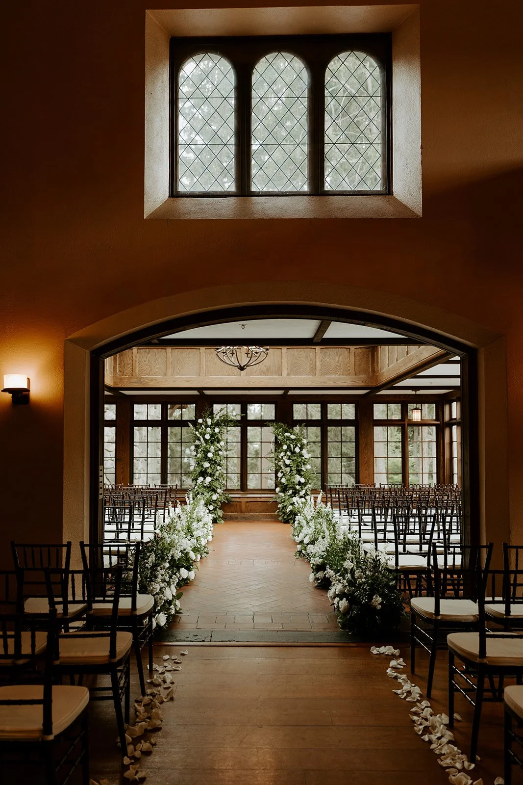 An indoor wedding ceremony at Willowdale Estate