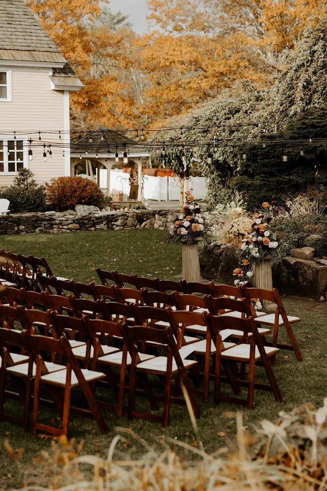 A wedding ceremony setup at Bedford Village inn for a fall wedding