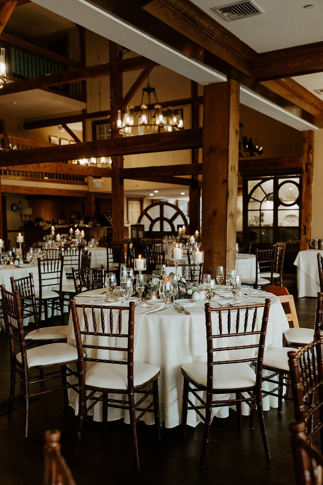 A fall wedding inside of the great hall at Bedford Village Inn