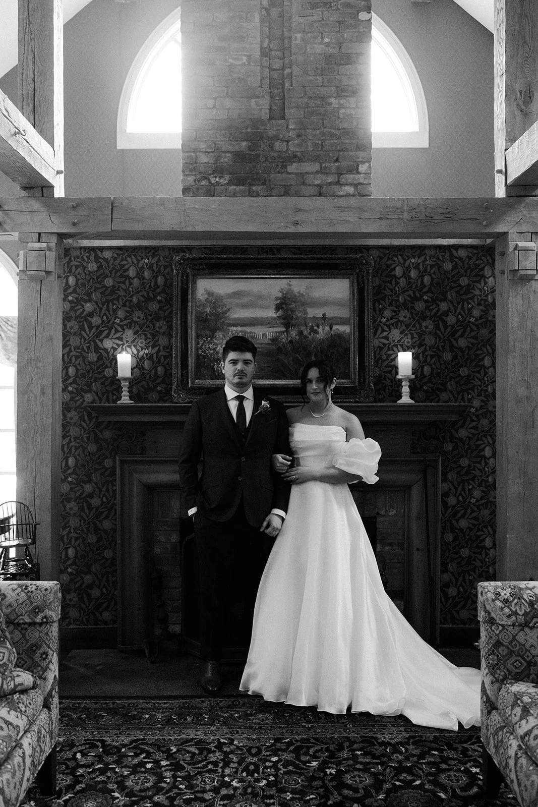 A bride and groom inside of the Bedford Village Inn