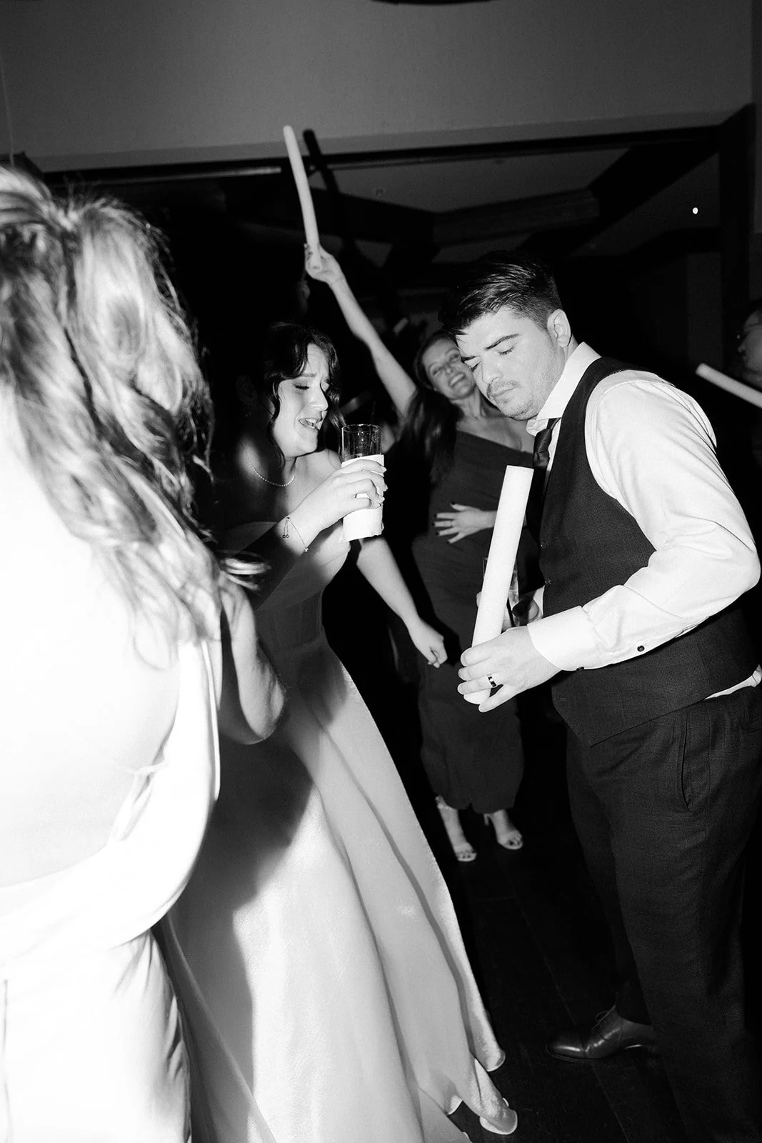 A bride and groom dancing at their wedding reception
