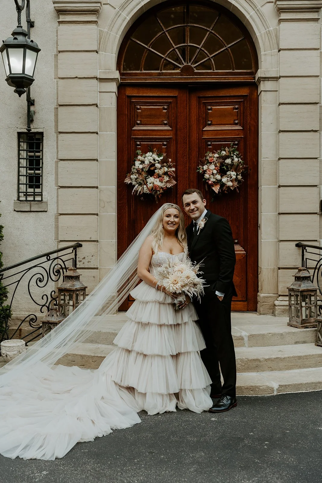 A bride and groom posing for wedding photos at their Rhode Island wedding venue Glen Manor