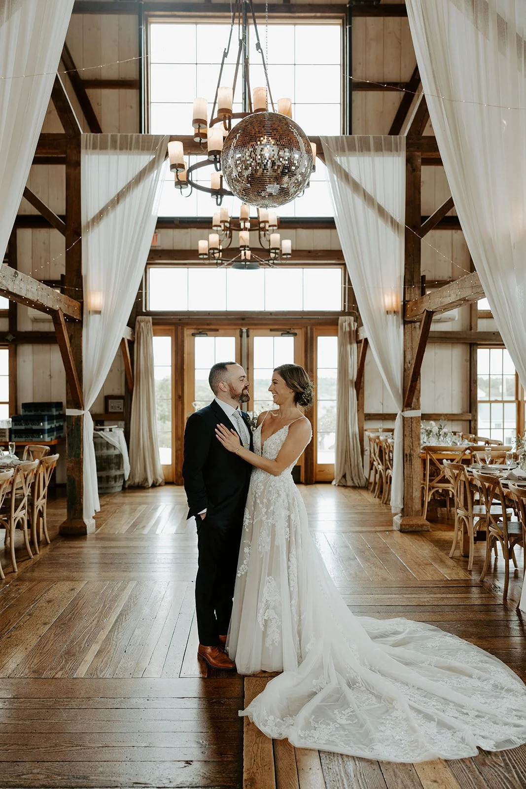 A bride and groom in a barn at Valley View Farm