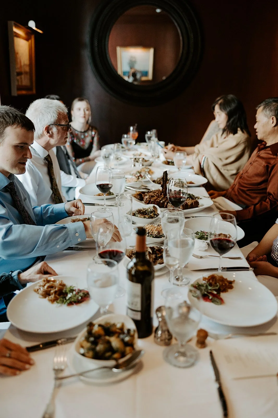 Wedding guests at lunch to celebrate an elopement