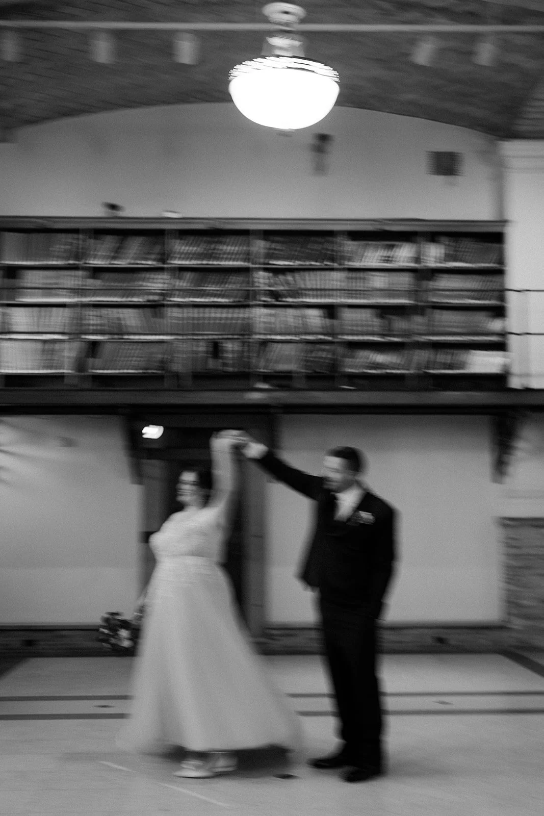 a bride and groom dancing at their Boston Public Library Wedding