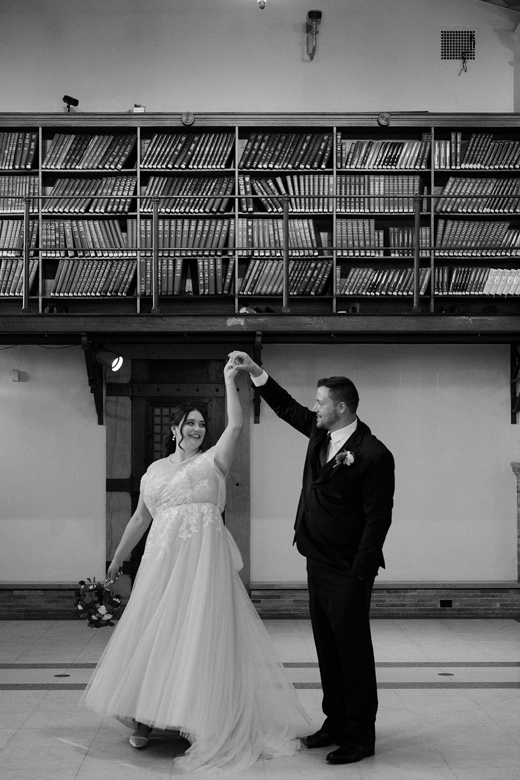 a bride and groom dancing at their Boston Public Library Wedding