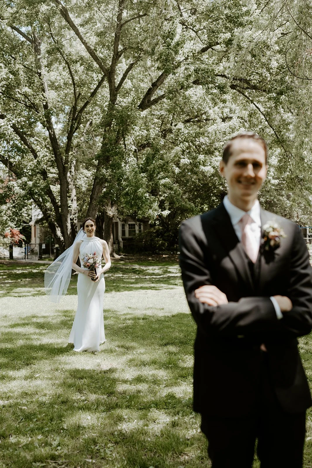 A bride and groom doing a wedding first look in Boston Public Garden