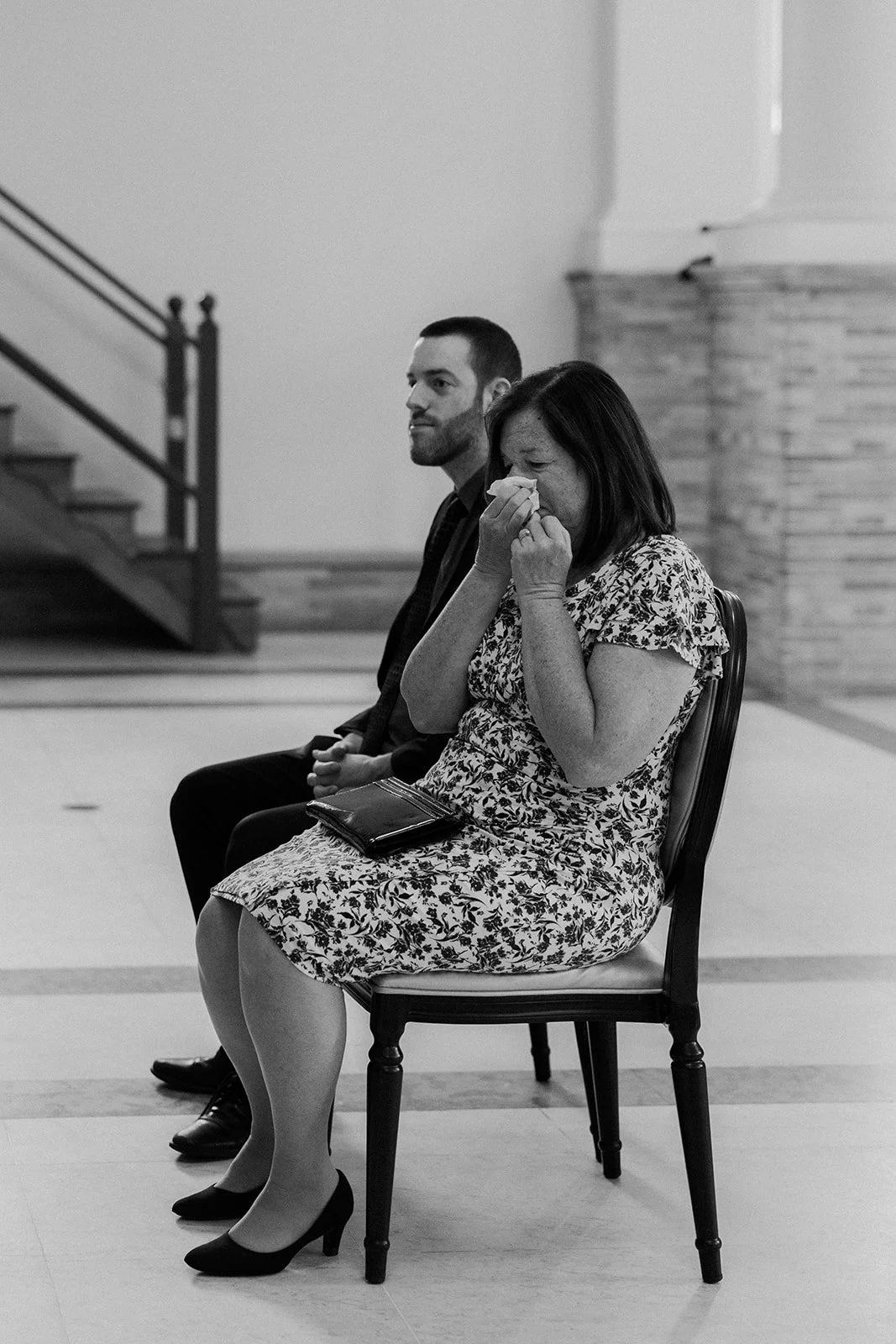 A wedding guest crying during a Boston Public Library wedding