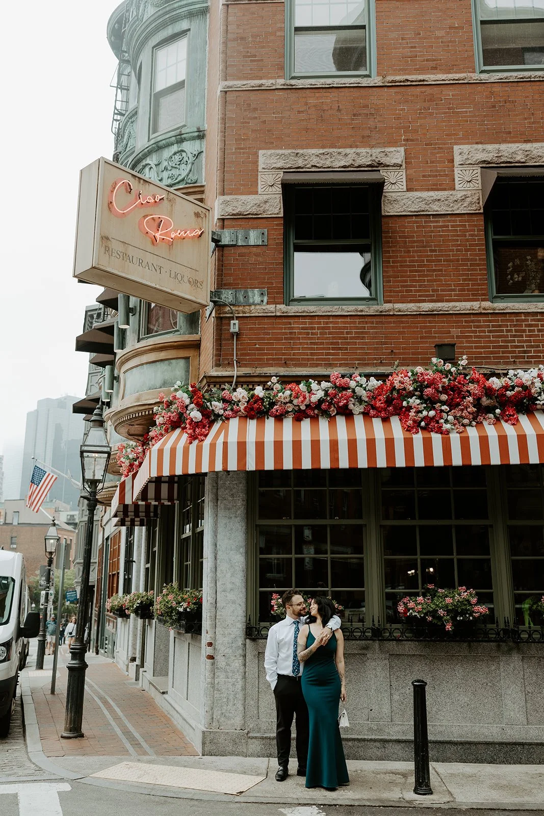 A couple posing at one of my favorite MAssachusetts engagement photo locations in North End
