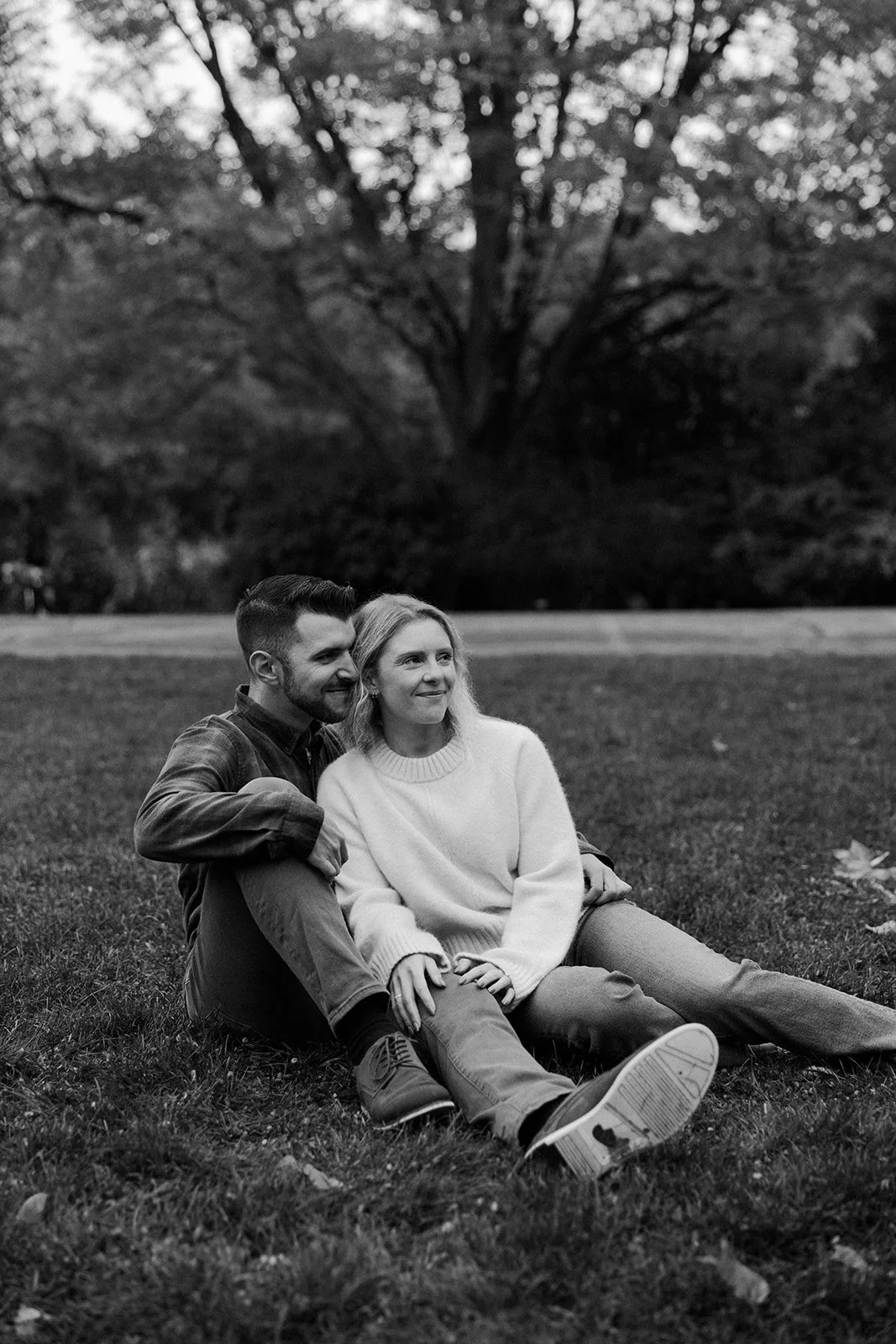 A couple posing for engagement photos at a Massachusetts engagement photo location