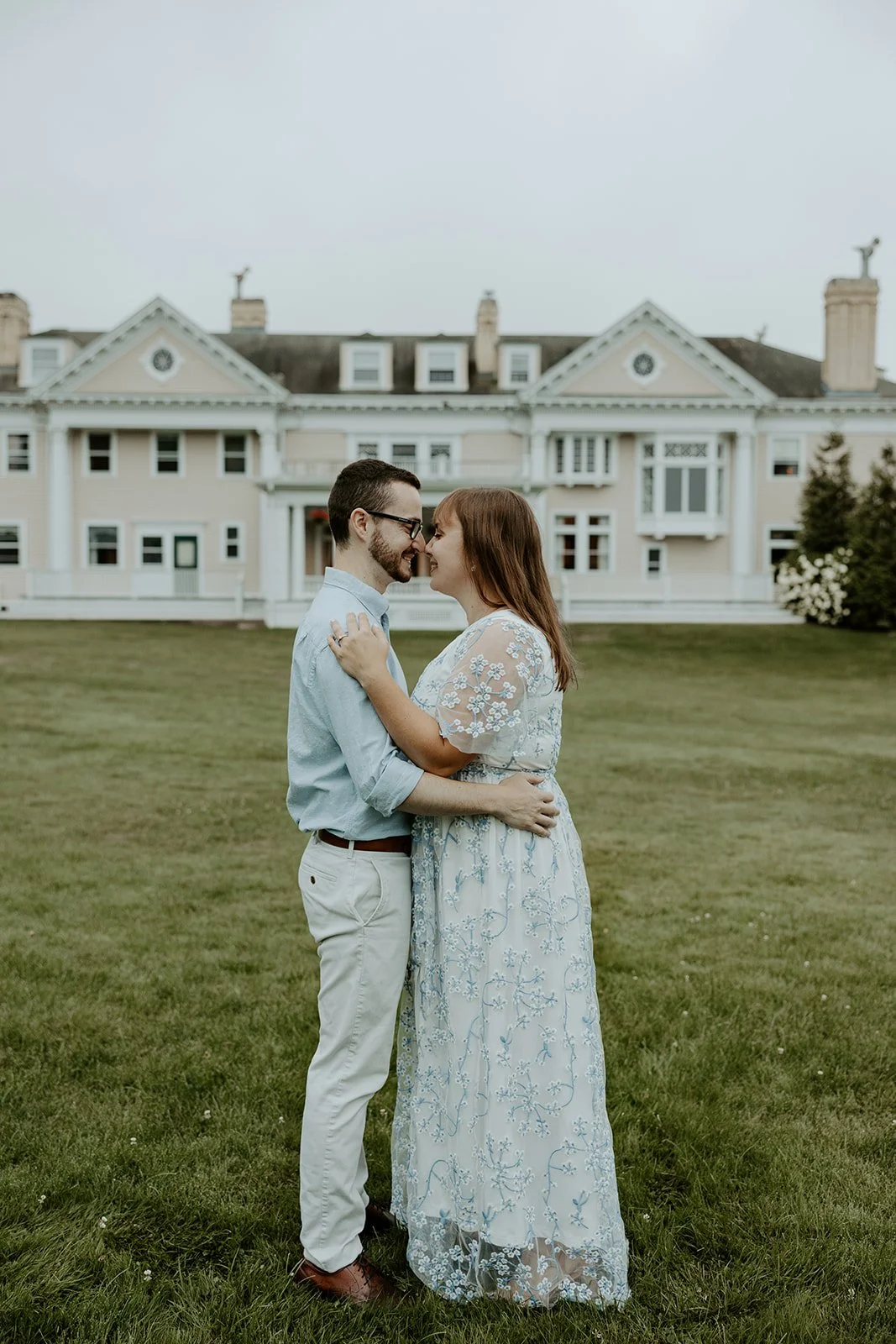 A couple taking engagement photos at Endicott Estate