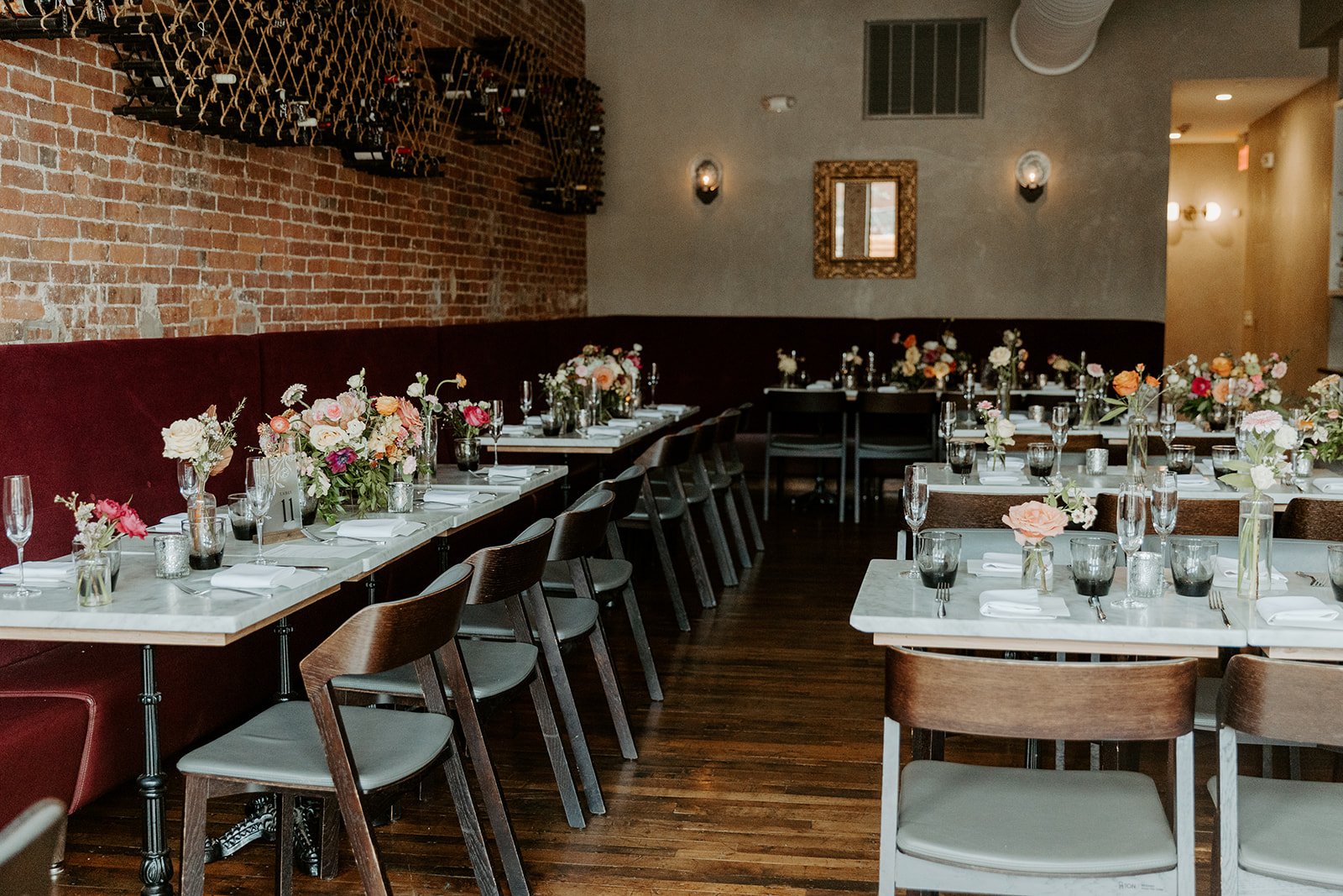 A restaurant setup for a wedding reception