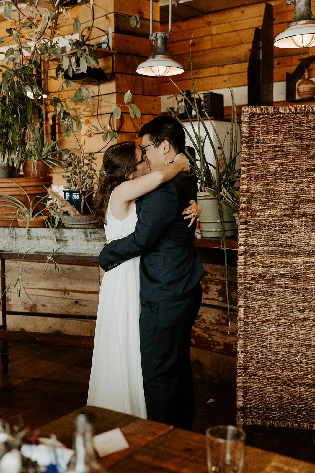 A bride and groom during their restaurant wedding ceremony