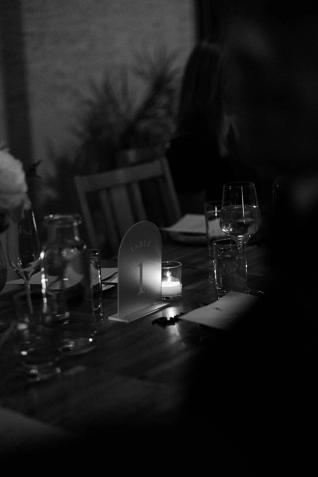A candlelit table at a wedding reception