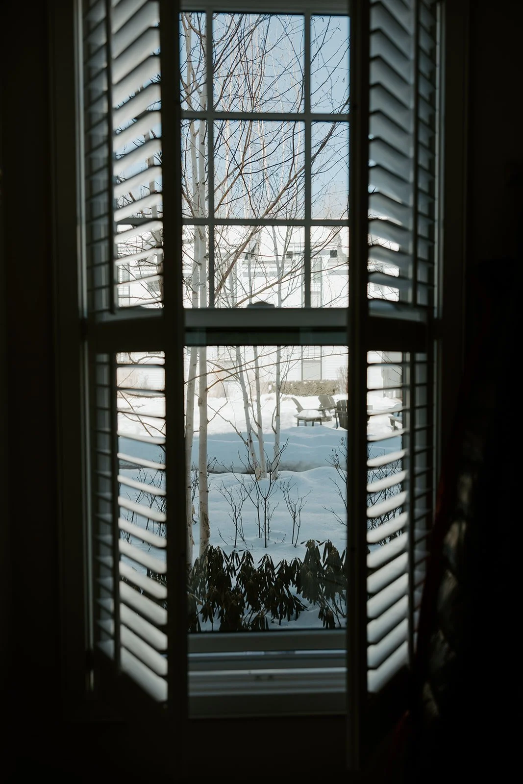 A view of an off season wedding from a window