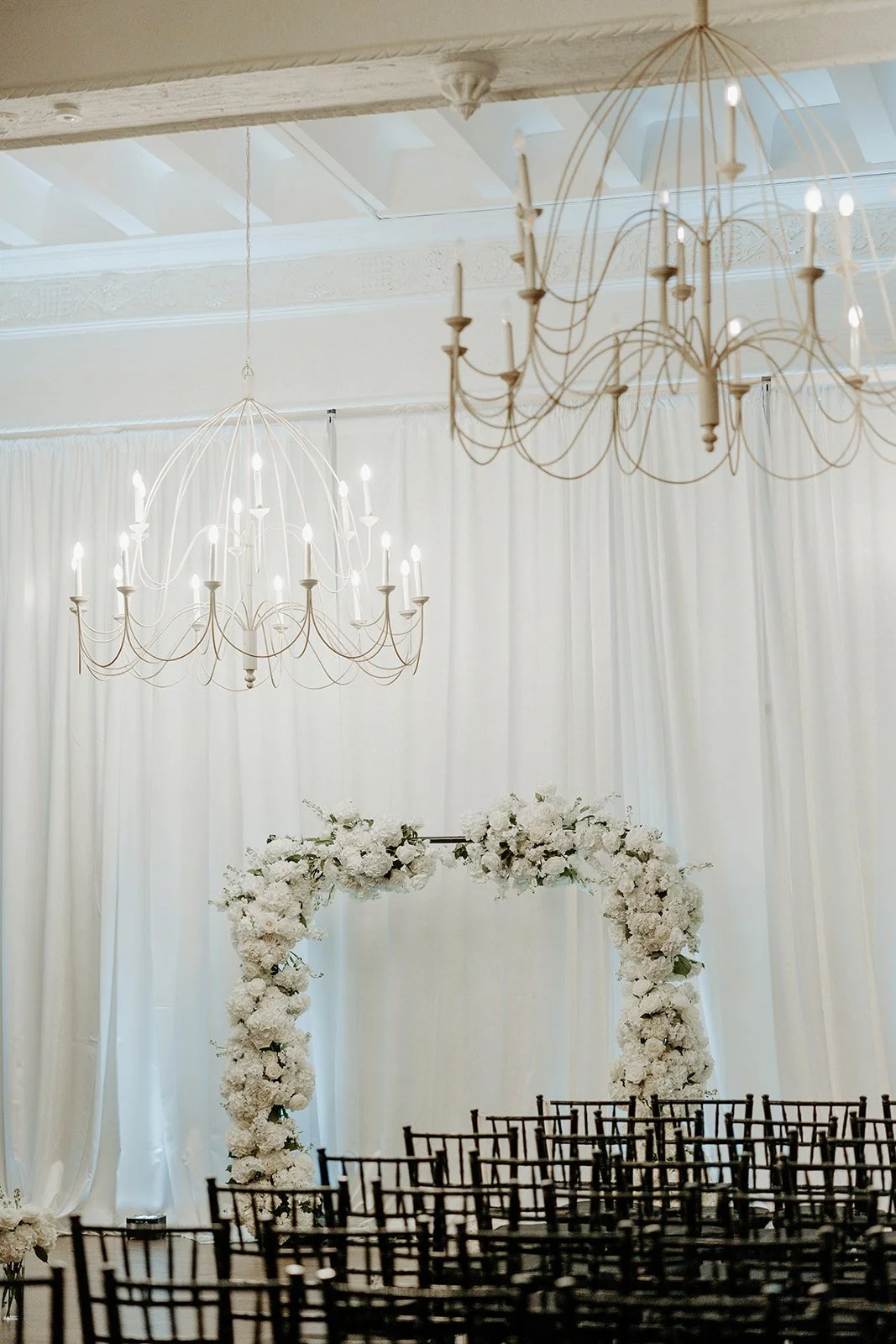 A wedding ceremony setup indoors for a winter wedding