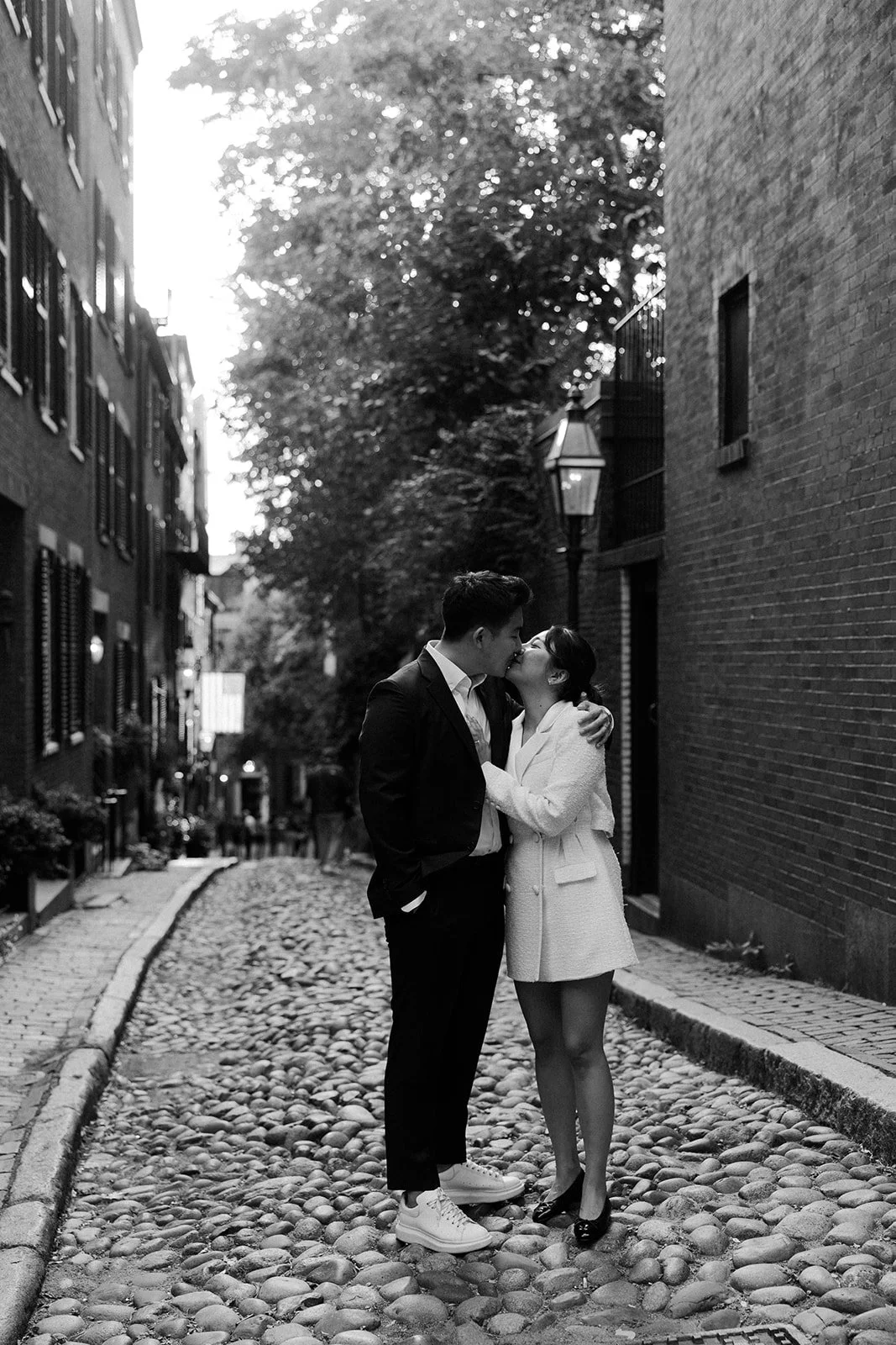 A couple dressed up, showing what to wear for engagement photos that are classy