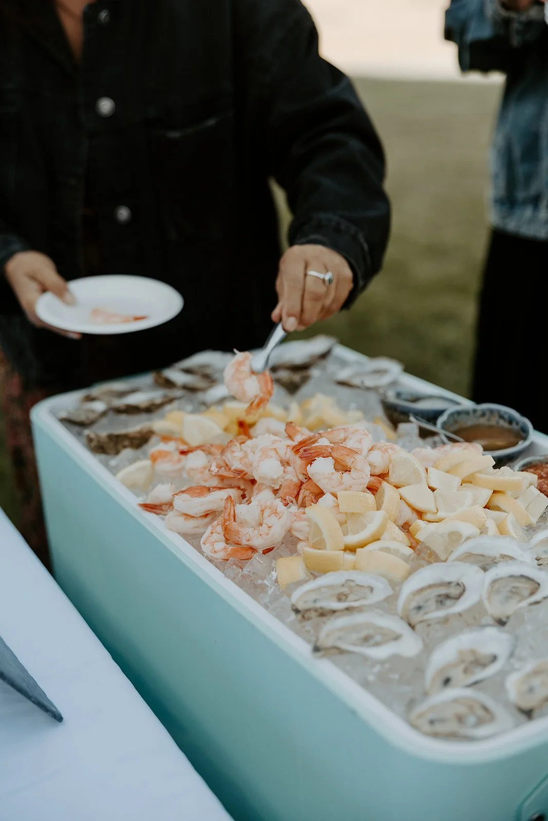 An oyster bar station at a backyard wedding, as ideas for a backyard wedding