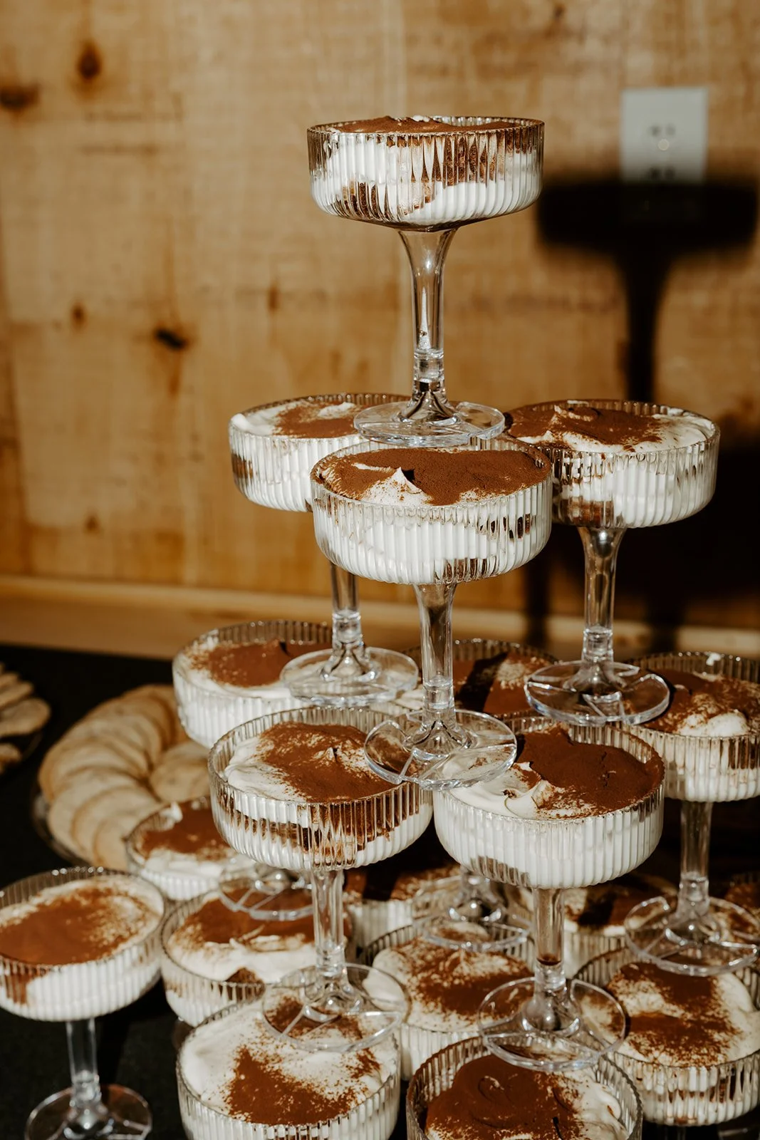 A tiramisu tower at a backyard wedding