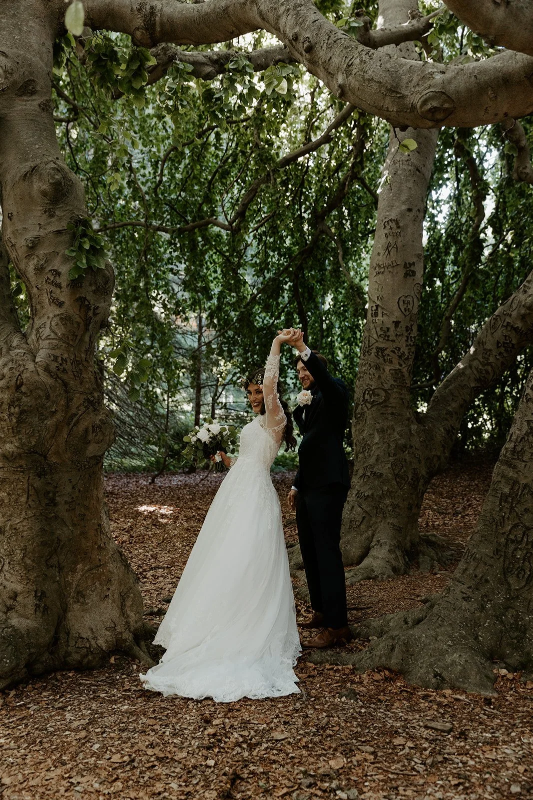 A bride and groom taking wedding photos at Glen Magna Farms